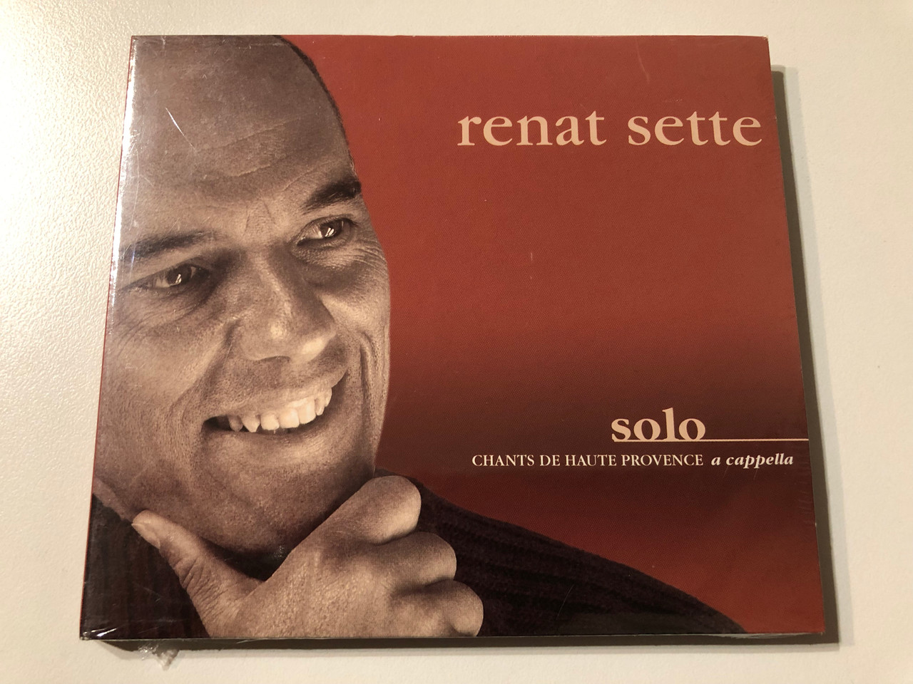 https://cdn11.bigcommerce.com/s-62bdpkt7pb/products/0/images/323787/Renat_Sette_Solo_a_capella_-_Chants_De_Haute_Provence_Buda_Musique_Audio_CD_860129_1__91072.1707371079.1280.1280.JPG?c=2
