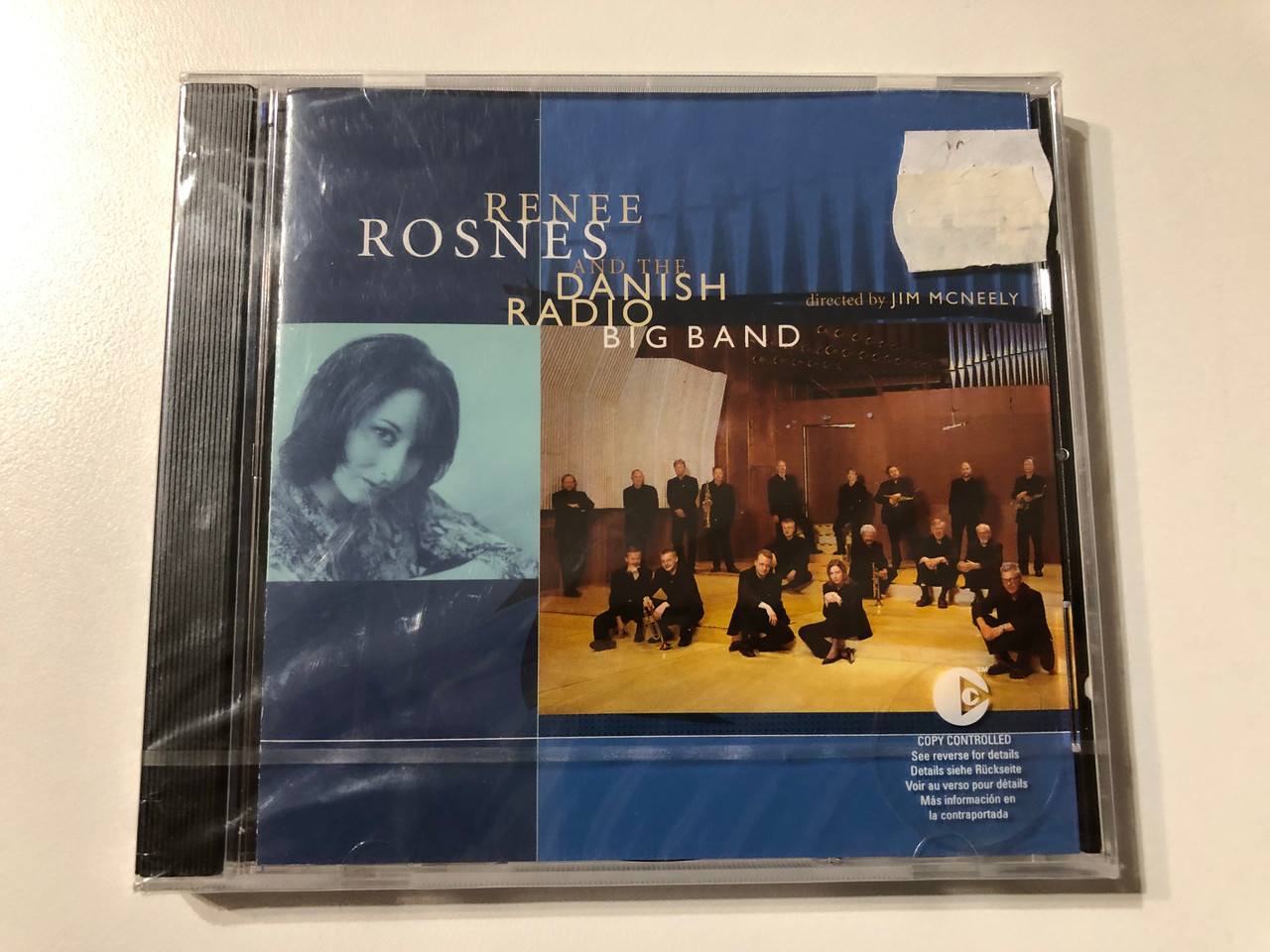 https://cdn11.bigcommerce.com/s-62bdpkt7pb/products/0/images/323870/Renee_Rosnes_And_The_Danish_Radio_Big_Band_-_directed_by_Jim_McNeely_EMI_Audio_CD_2003_72435_90799_29_1__64900.1707458878.1280.1280.JPG?c=2