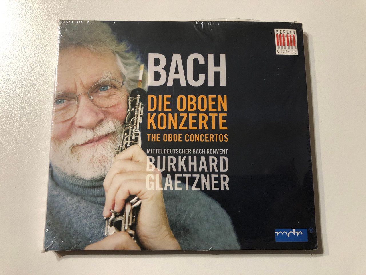 https://cdn11.bigcommerce.com/s-62bdpkt7pb/products/0/images/324323/Bach_Die_Oboen_Konzerte_The_Oboe_Concertos_-_Mitteldeutscher_Bach_Konvent_Burkhard_Glaetzner_edel_Classics_Audio_CD_2007_0016092BC_1__34761.1707940721.1280.1280.JPG?c=2