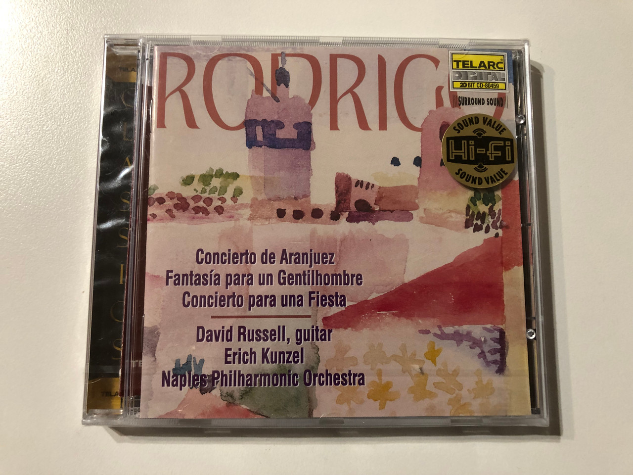 https://cdn11.bigcommerce.com/s-62bdpkt7pb/products/0/images/324415/Rodrigo_-_Concierto_De_Aranjuez_Fantasa_Para_Un_Gentilhombre_Concierto_Para_Un_Fiesta_-_David_Russell_guitar_Erich_Kunzel_Naples_Philharmonic_Orchestra_Telarc_20_Audio_CD_1997_CD-8045_1__19537.1707996605.1280.1280.JPG?c=2