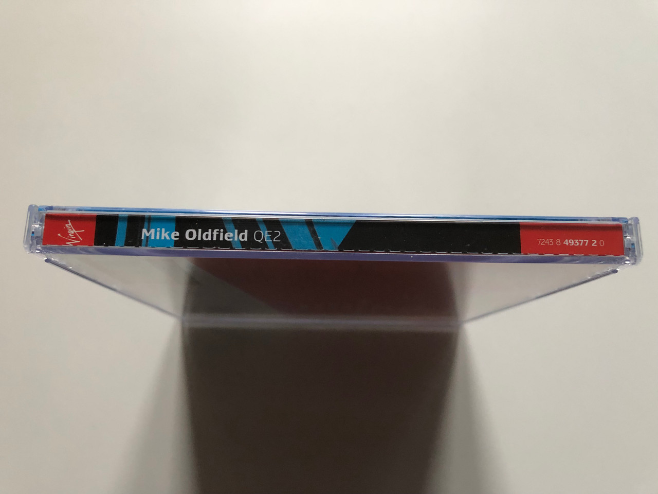https://cdn11.bigcommerce.com/s-62bdpkt7pb/products/0/images/325632/Mike_Oldfield_QE2_Mike_Oldfield_Remastered_HDCD_Virgin_Audio_CD_2000_724384937720_3__11435.1709022684.1280.1280.JPG?c=2