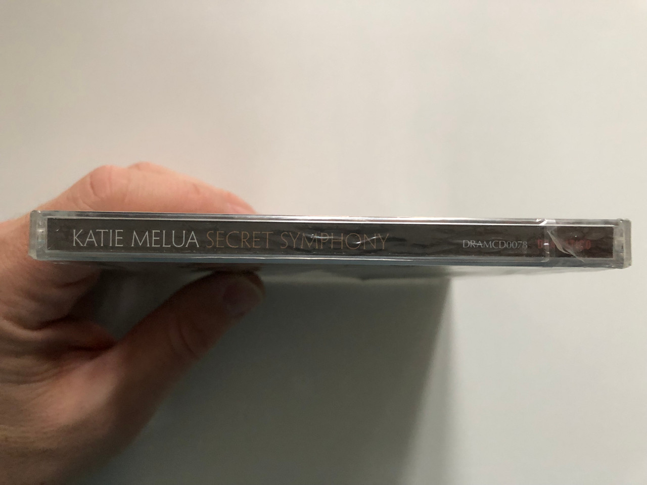 https://cdn11.bigcommerce.com/s-62bdpkt7pb/products/0/images/326095/Katie_Melua_Secret_Symphony_Dramatico_Audio_CD_2012_DRAMCD0078_3__40879.1709283261.1280.1280.JPG?c=2
