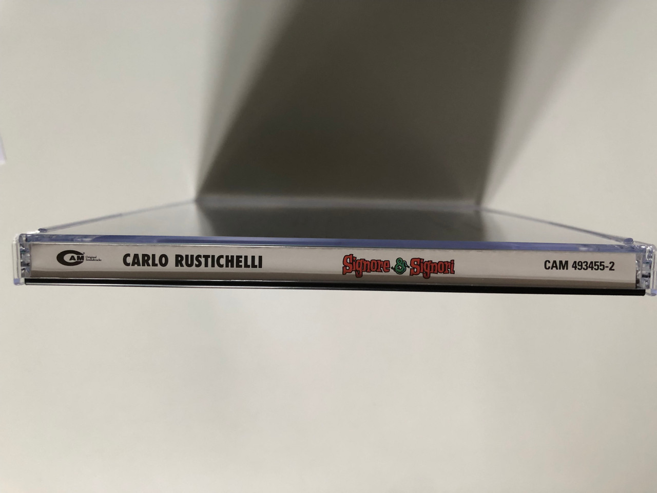 https://cdn11.bigcommerce.com/s-62bdpkt7pb/products/0/images/326462/Signore_Signori_The_Birds_The_Bees_And_The_Italians_-_Music_Composed_By_Carlo_Rustichelli_A_Film_Directed_By_Pietro_Germi_CAM_Audio_CD_2001_CAM_493455-2_3__32501.1709545060.1280.1280.JPG?c=2