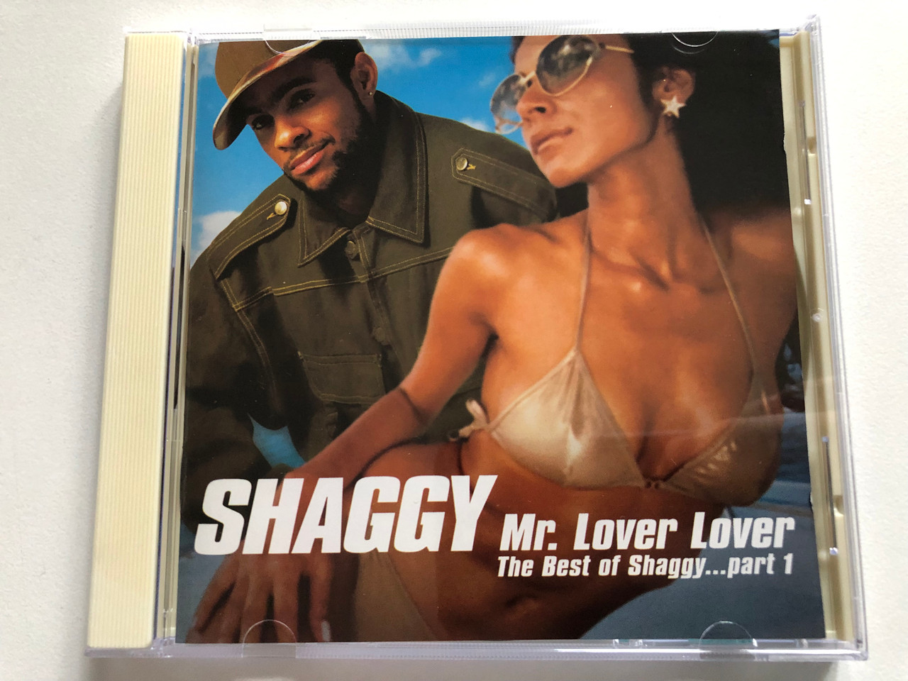 https://cdn11.bigcommerce.com/s-62bdpkt7pb/products/0/images/326463/Shaggy_Mr._Lover_Lover_The_Best_Of_Shaggy..._Part_1_Virgin_Audio_CD_2002_724381182321_1__15884.1709545420.1280.1280.JPG?c=2