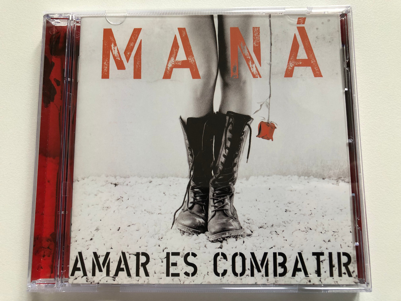 https://cdn11.bigcommerce.com/s-62bdpkt7pb/products/0/images/326466/Man_Amar_Es_Combatir_Warner_Music_Mexico_Audio_CD_2006_2564636612_1__76874.1709545641.1280.1280.JPG?c=2