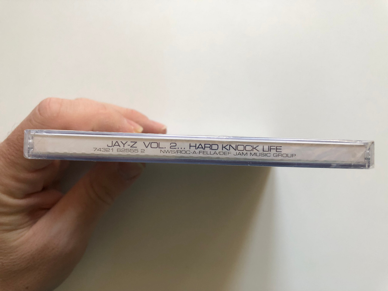 https://cdn11.bigcommerce.com/s-62bdpkt7pb/products/0/images/326550/Jay-Z_-_Vol._2..._Hard_Knock_Life_Northwestside_Audio_CD_1998_74321_62555_2_3__14786.1709622310.1280.1280.JPG?c=2