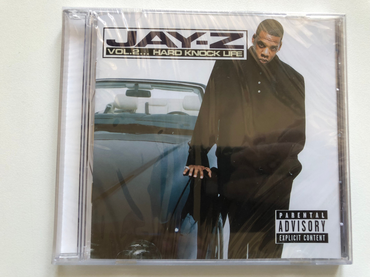 https://cdn11.bigcommerce.com/s-62bdpkt7pb/products/0/images/326551/Jay-Z_-_Vol._2..._Hard_Knock_Life_Northwestside_Audio_CD_1998_74321_62555_2_1__76891.1709622311.1280.1280.JPG?c=2