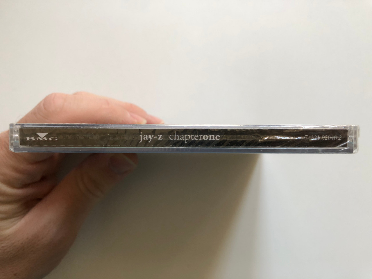 https://cdn11.bigcommerce.com/s-62bdpkt7pb/products/0/images/326553/Jay-Z_Chapter_One_BMG_Audio_CD_2002_74321_92046_2_3__38490.1709623053.1280.1280.JPG?c=2