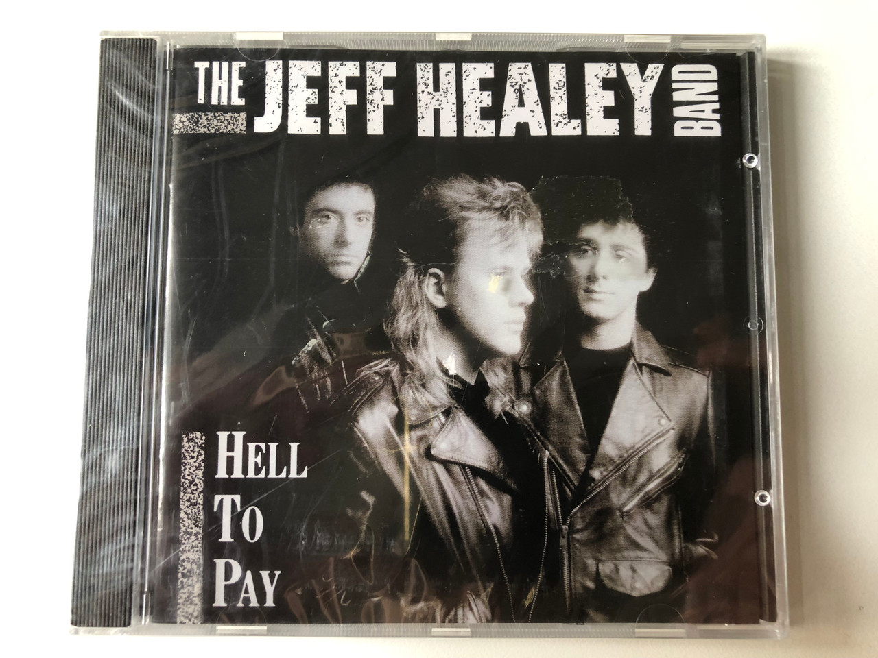 https://cdn11.bigcommerce.com/s-62bdpkt7pb/products/0/images/326661/The_Jeff_Healey_Band_Hell_To_Pay_Arista_Audio_CD_1990_260_815_1__16560.1709722154.1280.1280.JPG?c=2