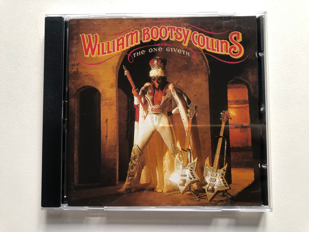 https://cdn11.bigcommerce.com/s-62bdpkt7pb/products/0/images/326739/William_Bootsy_Collins_The_One_Giveth_The_Count_Taketh_Away_Warner_Bros._Records_Audio_CD_1996_7599-23667-2_1__45393.1709806594.1280.1280.JPG?c=2