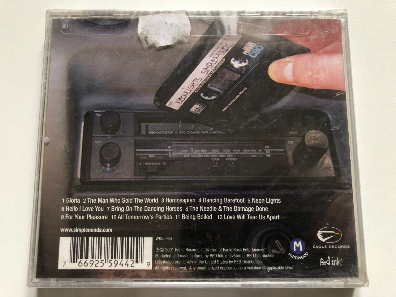 https://cdn11.bigcommerce.com/s-62bdpkt7pb/products/0/images/327131/Simple_Minds_Neon_Lights_Special_Limited_Edition_Release_featuring_the_new_hit_single_Dancing_Barefoo_Eagle_Records_Audio_CD_2001_WK55944_2__41228.1710426321.1280.1280.JPG?c=2