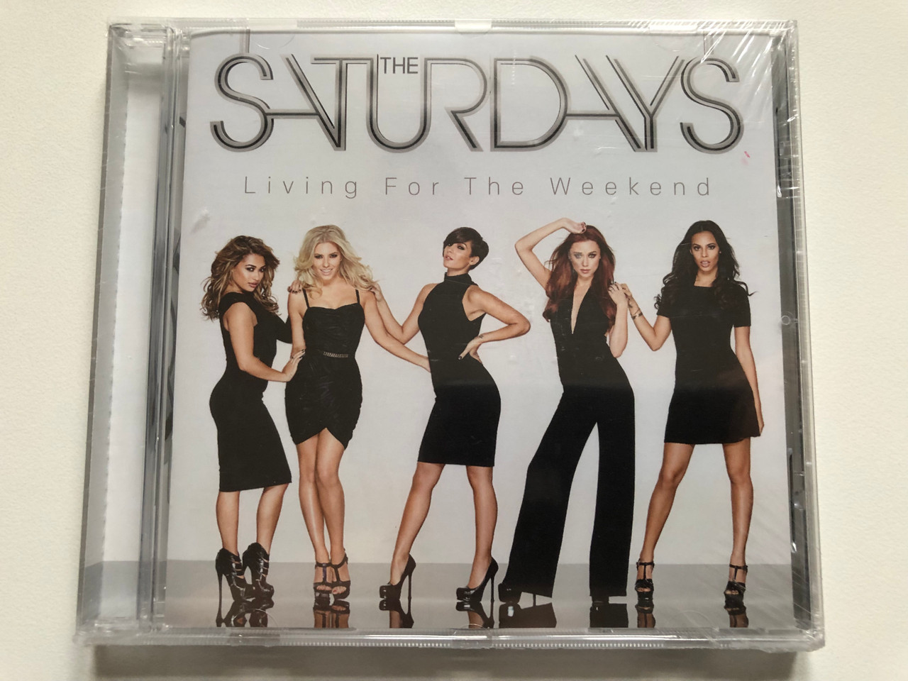 https://cdn11.bigcommerce.com/s-62bdpkt7pb/products/0/images/327158/The_Saturdays_Living_For_The_Weekend_Polydor_Audio_CD_2013_375_424-0_1__29510.1710435792.1280.1280.JPG?c=2