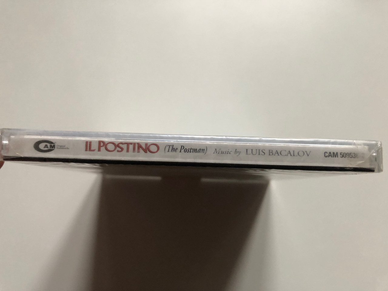 https://cdn11.bigcommerce.com/s-62bdpkt7pb/products/0/images/327161/Il_Postino_The_Postman_-_Music_composed_orchestrated_and_conducted_by_Luis_Bacalov_Oscar_1995_for_Best_Original_Dramatic_Score_A_Film_directed_by_Michael_Radford_in_collaboration_with_3__57323.1710436328.1280.1280.JPG?c=2
