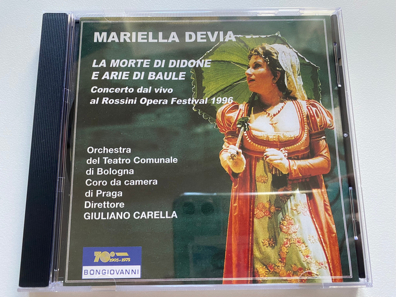 https://cdn11.bigcommerce.com/s-62bdpkt7pb/products/0/images/328136/Mariella_Devia_La_Morte_di_Didone_e_arie_di_baule_Concerto_dal_vivo_al_Rossini_Opera_Festival_1996_-_Orchestra_Del_Teatro_Comunale_Di_Bologna_Coro_Da_Camera_Di_Praga_Giuliano_Carella_1__03023.1710839846.1280.1280.jpg?c=2
