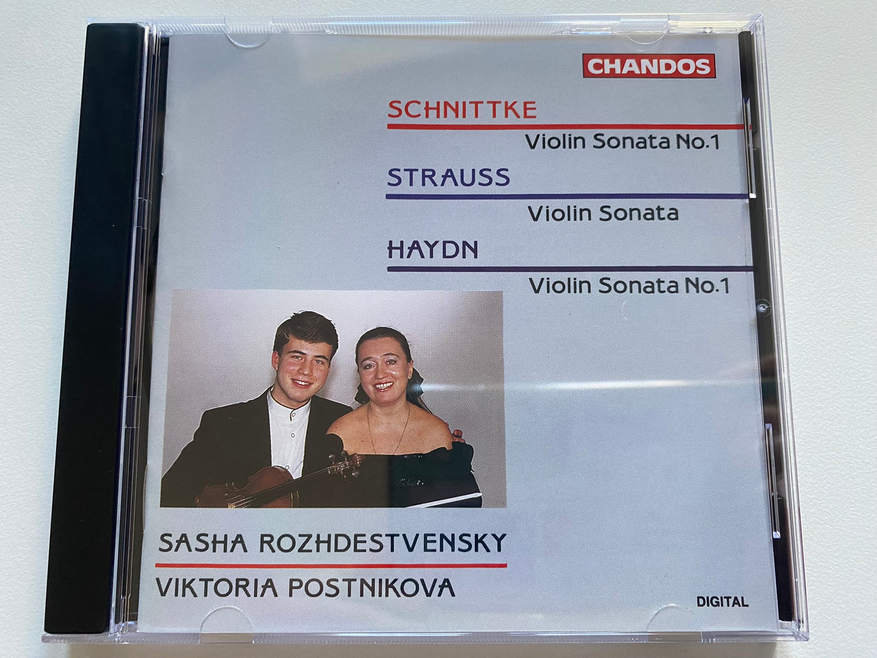 https://cdn11.bigcommerce.com/s-62bdpkt7pb/products/0/images/328288/Schnittke_Violin_Sonata_No._1_Strauss_Violin_Sonata_Haydn_Violin_Sonata_No._1_-_Sasha_Rozhdestvensky_Viktoria_Postnikova_Chandos_Audio_CD_1994_CHAN_9274_1__36675.1710912842.1280.1280.jpg?c=2