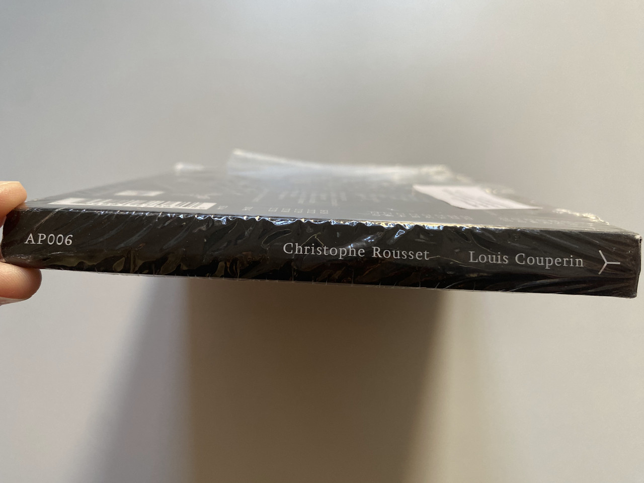 https://cdn11.bigcommerce.com/s-62bdpkt7pb/products/0/images/328615/Christophe_Rousset_Louis_Couperin_Apart_2x_Audio_CD_2010_AP006_3__75199.1711009024.1280.1280.JPG?c=2