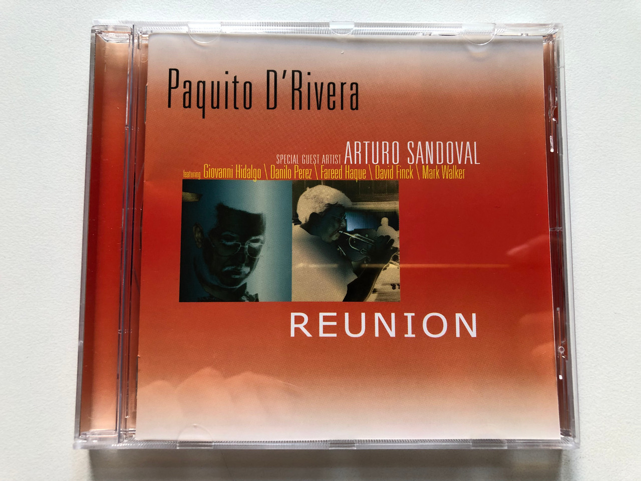https://cdn11.bigcommerce.com/s-62bdpkt7pb/products/0/images/328642/Paquito_DRivera_Special_Guest_Artist_Arturo_Sandoval_Featuring_Giovanni_Hidalgo_Danilo_Perez_Fareed_Haque_David_Finck_Mark_Walker_-_Reunion_DiscMedi_Blau_Audio_CD_DM4087-02_1__58374.1711014048.1280.1280.JPG?c=2