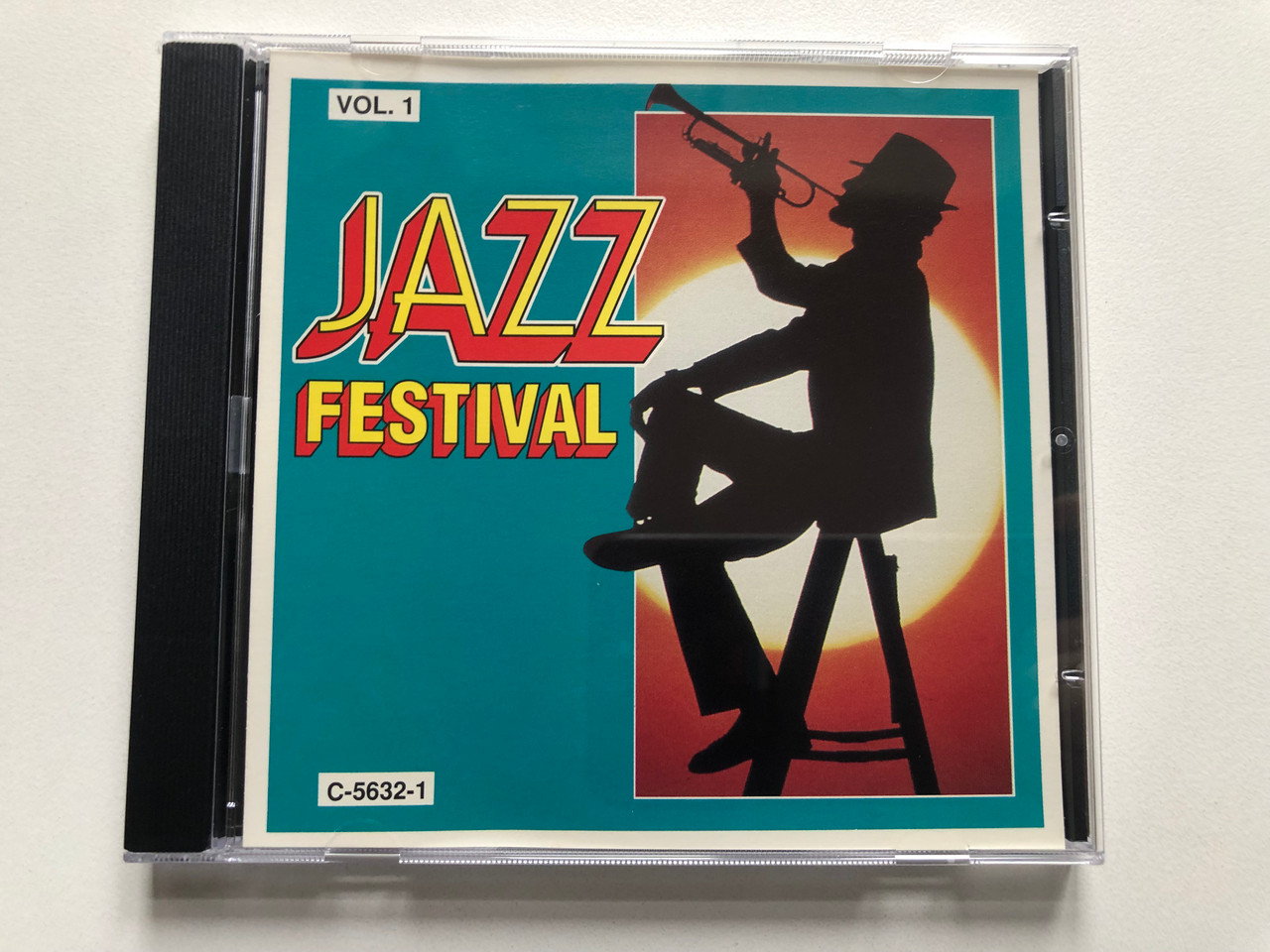 https://cdn11.bigcommerce.com/s-62bdpkt7pb/products/0/images/329362/Jazz_Festival_-_Vol._1_Madacy_Audio_CD_C-5632-1_1__17627.1711384561.1280.1280.JPG?c=2