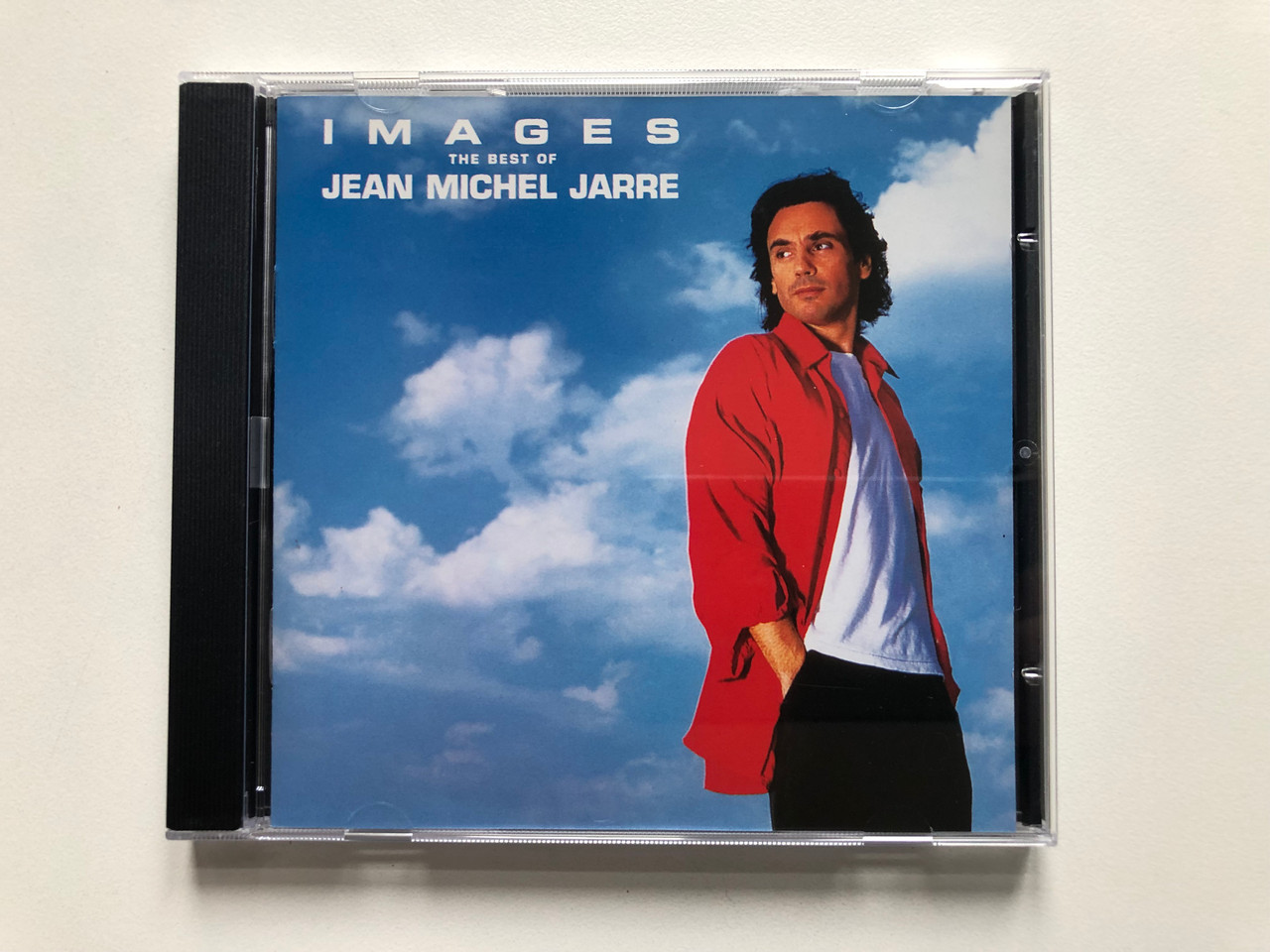 https://cdn11.bigcommerce.com/s-62bdpkt7pb/products/0/images/329368/Images_The_Best_Of_Jean_Michel_Jarre_Disques_Dreyfus_Audio_CD_1987_FDM_36151-2_1__20471.1711385030.1280.1280.JPG?c=2