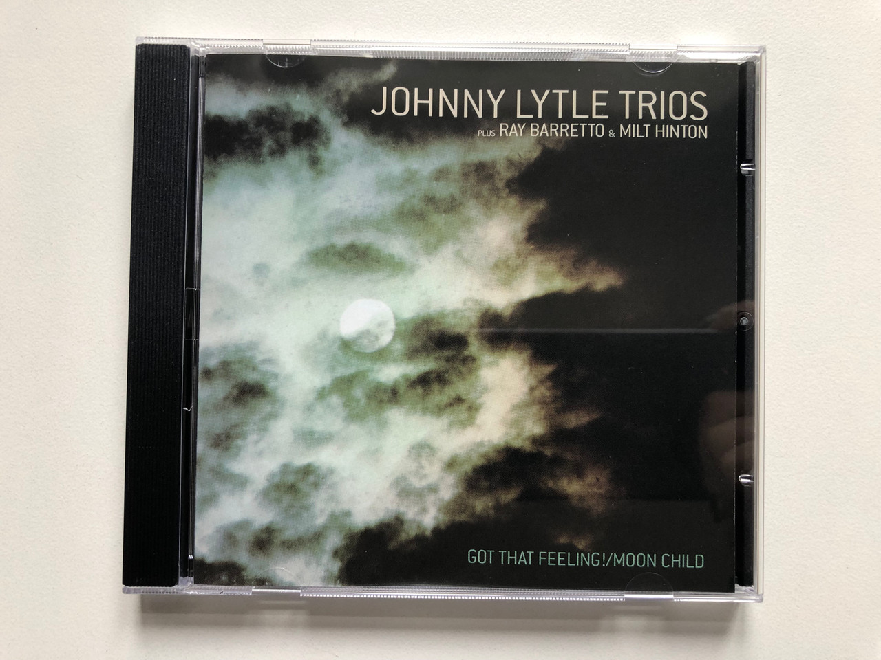 https://cdn11.bigcommerce.com/s-62bdpkt7pb/products/0/images/329377/Johnny_Lytle_Trio_plus_Ray_Barretto_Milt_Hinton_Got_That_Feeling_Moon_Child_Milestone_Audio_CD_2001_Stereo_MCD-47093-2_1__10960.1711387661.1280.1280.JPG?c=2