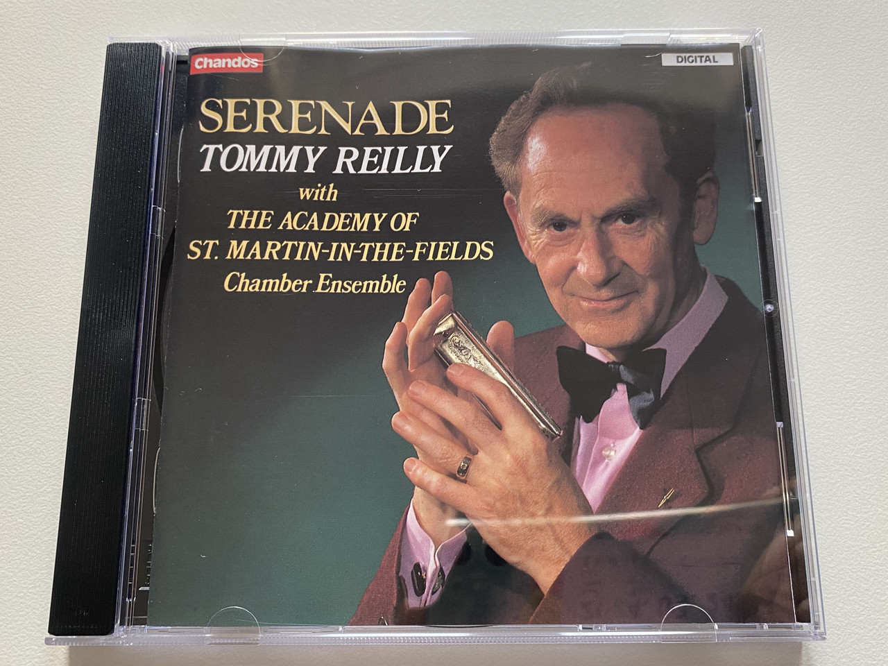https://cdn11.bigcommerce.com/s-62bdpkt7pb/products/0/images/329976/Serenade_-_Tommy_Reilly_With_The_Academy_Of_St._Martin-in-the-Fields_Chamber_Ensemble_Chandos_Audio_CD_1986_CHAN_8486_1__80649.1711642955.1280.1280.JPG?c=2