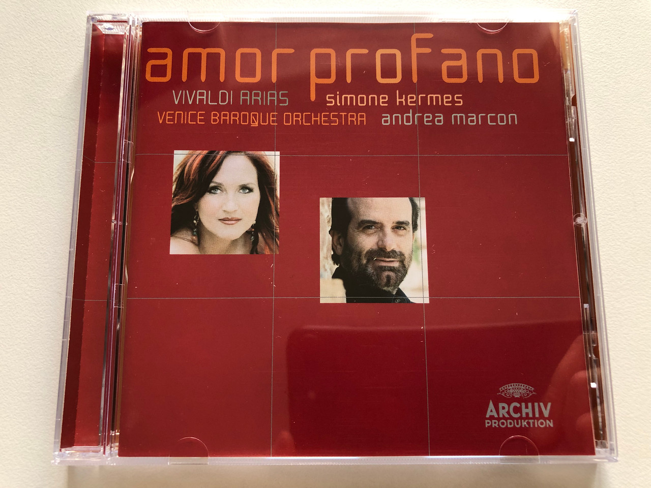 https://cdn11.bigcommerce.com/s-62bdpkt7pb/products/0/images/330361/Amor_Profano_Vivaldi_Arias_-_Simone_Kermes_Venice_Baroque_Orchestra_Andrea_Marcon_Archiv_Produktion_Audio_CD_2007_477_6618_1__68570.1711991482.1280.1280.JPG?c=2