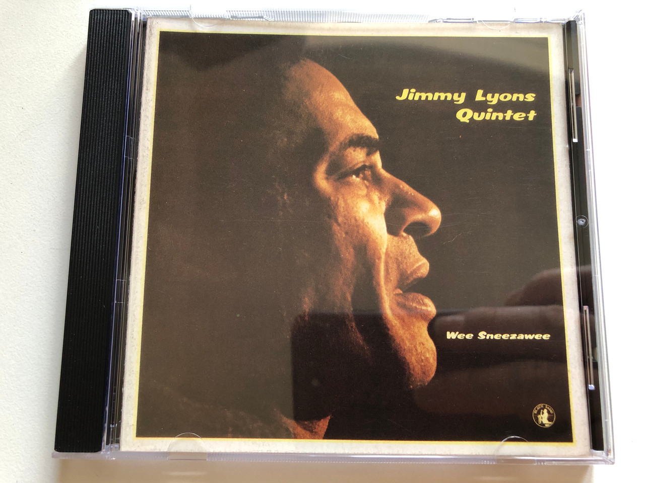 https://cdn11.bigcommerce.com/s-62bdpkt7pb/products/0/images/330388/Jimmy_Lyons_Quintet_Wee_Sneezawee_Black_Saint_Audio_CD_120067-2_1__96741.1711996227.1280.1280.JPG?c=2