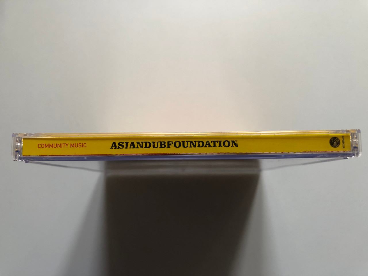 https://cdn11.bigcommerce.com/s-62bdpkt7pb/products/0/images/330484/Asian_Dub_Foundation_Community_Music_FFRR_Audio_CD_2000_8573820422_3__04752.1712072926.1280.1280.JPG?c=2