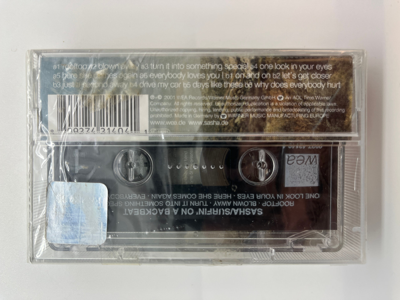 https://cdn11.bigcommerce.com/s-62bdpkt7pb/products/0/images/330676/Sasha_Surfin_On_A_Backbeat_WEA_Records_Audio_Cassette_2001_0927-42010-4_2__22077.1712300457.1280.1280.JPG?c=2