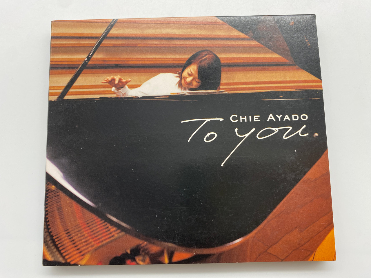 https://cdn11.bigcommerce.com/s-62bdpkt7pb/products/0/images/331308/Chie_Ayado_To_You_EWE_Records_Audio_CD_2003_EWSA_0078_1__41783.1713166608.1280.1280.JPG?c=2