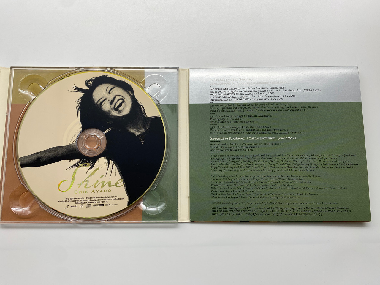 https://cdn11.bigcommerce.com/s-62bdpkt7pb/products/0/images/331315/Chie_Ayado_Shine_EWE_Records_Audio_CD_2003_EWSA_0083_3__26762.1713167079.1280.1280.JPG?c=2