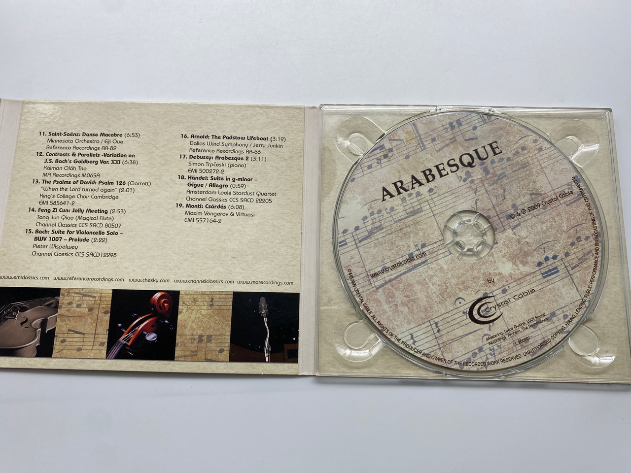 https://cdn11.bigcommerce.com/s-62bdpkt7pb/products/0/images/331341/Arabesque_by_Crystal_Cable_Crystal_Cable_Audio_CD_2009_CC_200901_3__30691.1713180914.1280.1280.JPG?c=2