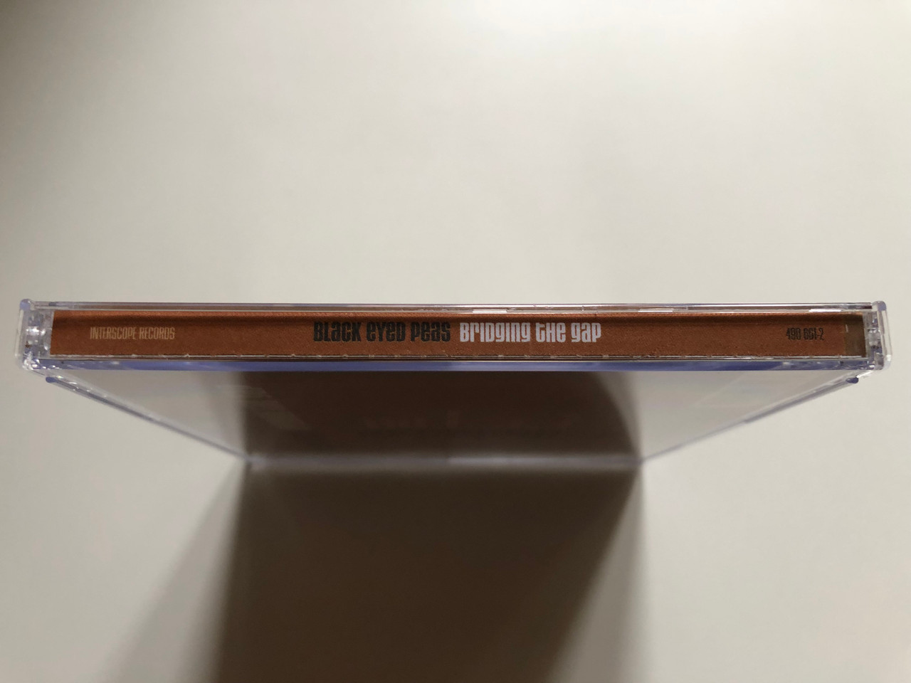 https://cdn11.bigcommerce.com/s-62bdpkt7pb/products/0/images/331431/Black_Eyed_Peas_Bridging_The_Gap_Interscope_Records_Audio_CD_2000_490_661-2_3__75516.1713282208.1280.1280.JPG?c=2
