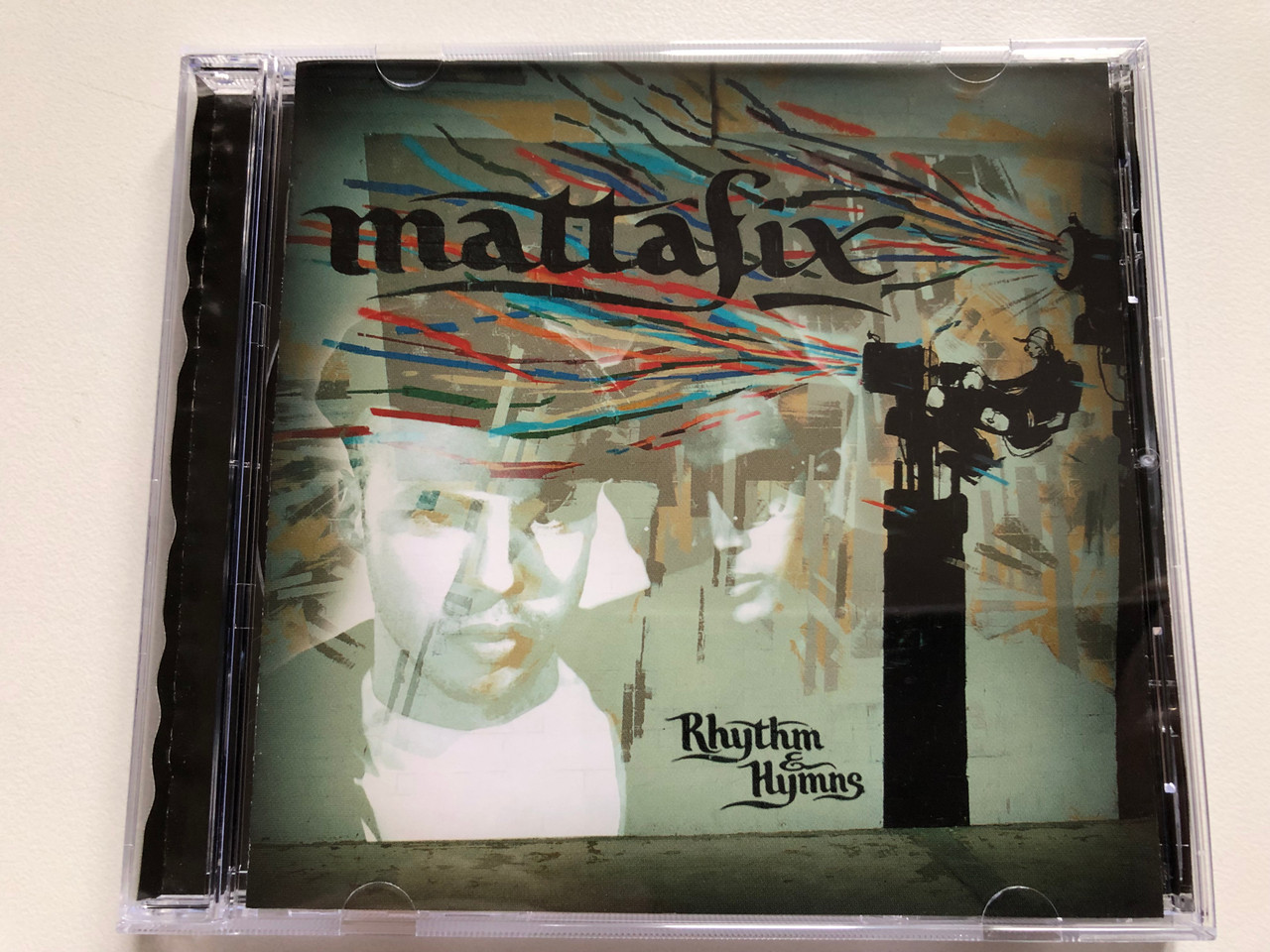 https://cdn11.bigcommerce.com/s-62bdpkt7pb/products/0/images/331432/Mattafix_Rhythm_Hymns_Delabel_Audio_CD_2007_5099950720309_1__61945.1713283165.1280.1280.JPG?c=2