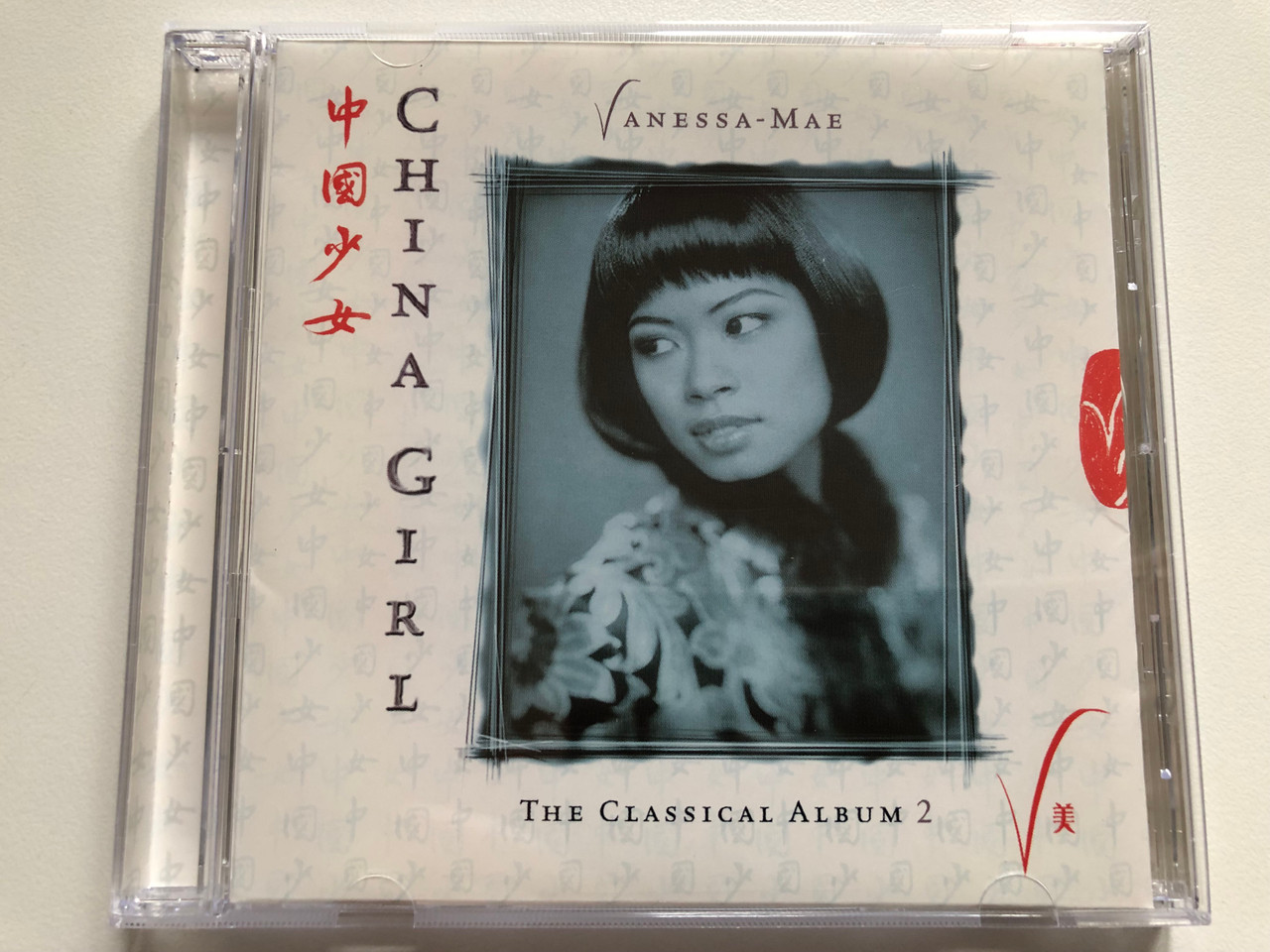 https://cdn11.bigcommerce.com/s-62bdpkt7pb/products/0/images/331435/Vanessa-Mae_China_Girl_-_The_Classical_Album_2_EMI_Classics_Audio_CD_1997_724355648327_1__38570.1713284318.1280.1280.JPG?c=2