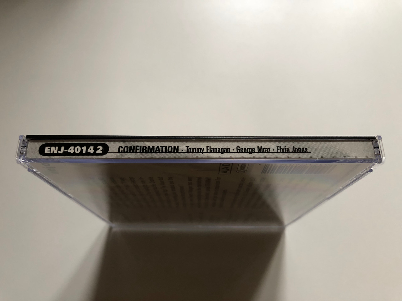 https://cdn11.bigcommerce.com/s-62bdpkt7pb/products/0/images/331488/Tommy_Flanagan_George_Mraz_Elvin_Jones_Confirmation_Enja_Records_Audio_CD_1999_ENJ-4014_2_3__96204.1713334902.1280.1280.JPG?c=2