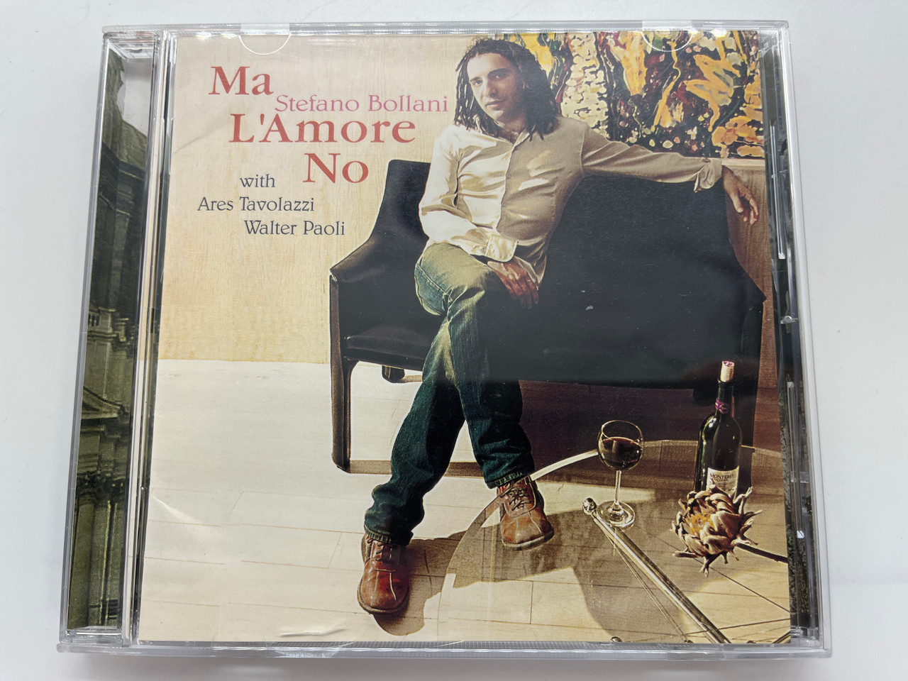 https://cdn11.bigcommerce.com/s-62bdpkt7pb/products/0/images/331576/Stefano_Bollani_Trio_Ma_LAmore_No_-_with_Ares_Tavolazzi_Walter_Paoli_Venus_Records_Audio_CD_2004_TKCV-35333_1__42000.1713431155.1280.1280.JPG?c=2