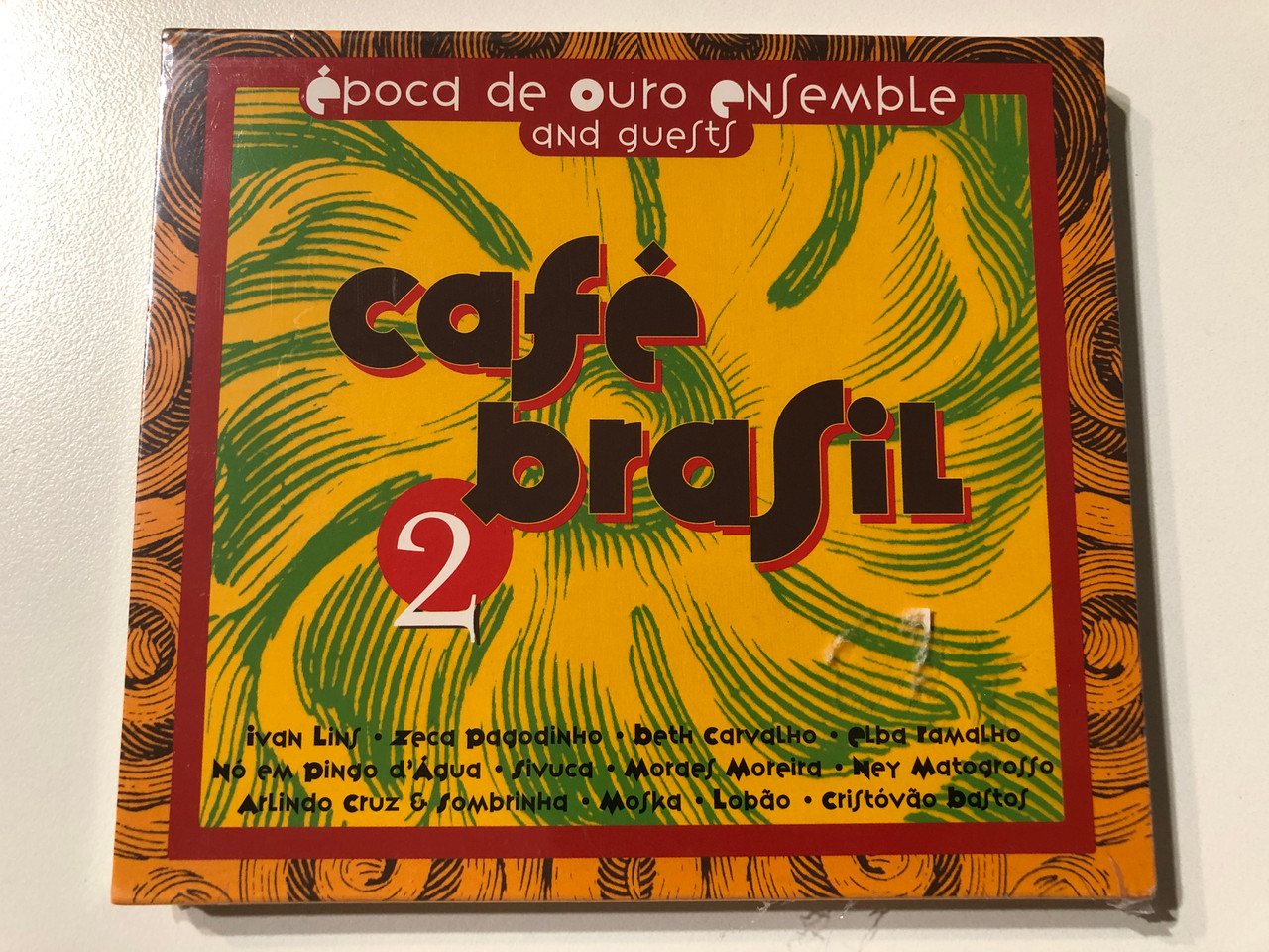 https://cdn11.bigcommerce.com/s-62bdpkt7pb/products/0/images/331857/Conjunto_poca_de_Ouro_E_Convidados_Caf_Brasil_2_-_Ivan_Lins_Zeca_Pagodinho_Beth_Carvalho_Elba_Ramalho_N_Em_Pingo_Dgua_Sivuca_Moraes_Moreira_Ney_Matogrosso_Arlindo_Cruz_Sombrinh_1__47115.1713948046.1280.1280.JPG?c=2