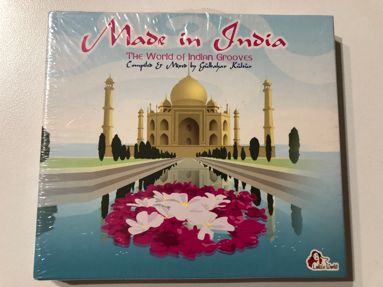 https://cdn11.bigcommerce.com/s-62bdpkt7pb/products/0/images/331933/Made_In_India_The_World_Of_Indian_Grooves_-_Compiled_Mixed_By_Gulbahar_Kultur_Lolas_World_2x_Audio_CD_cls0000612_1__51167.1714026219.1280.1280.JPG?c=2