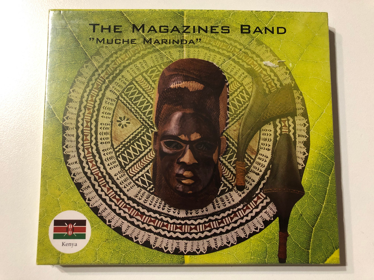 https://cdn11.bigcommerce.com/s-62bdpkt7pb/products/0/images/331960/The_Magazines_Band_Muche_Marinda_Kelele_Records_Audio_CD_203520-206_1__02482.1714028711.1280.1280.JPG?c=2