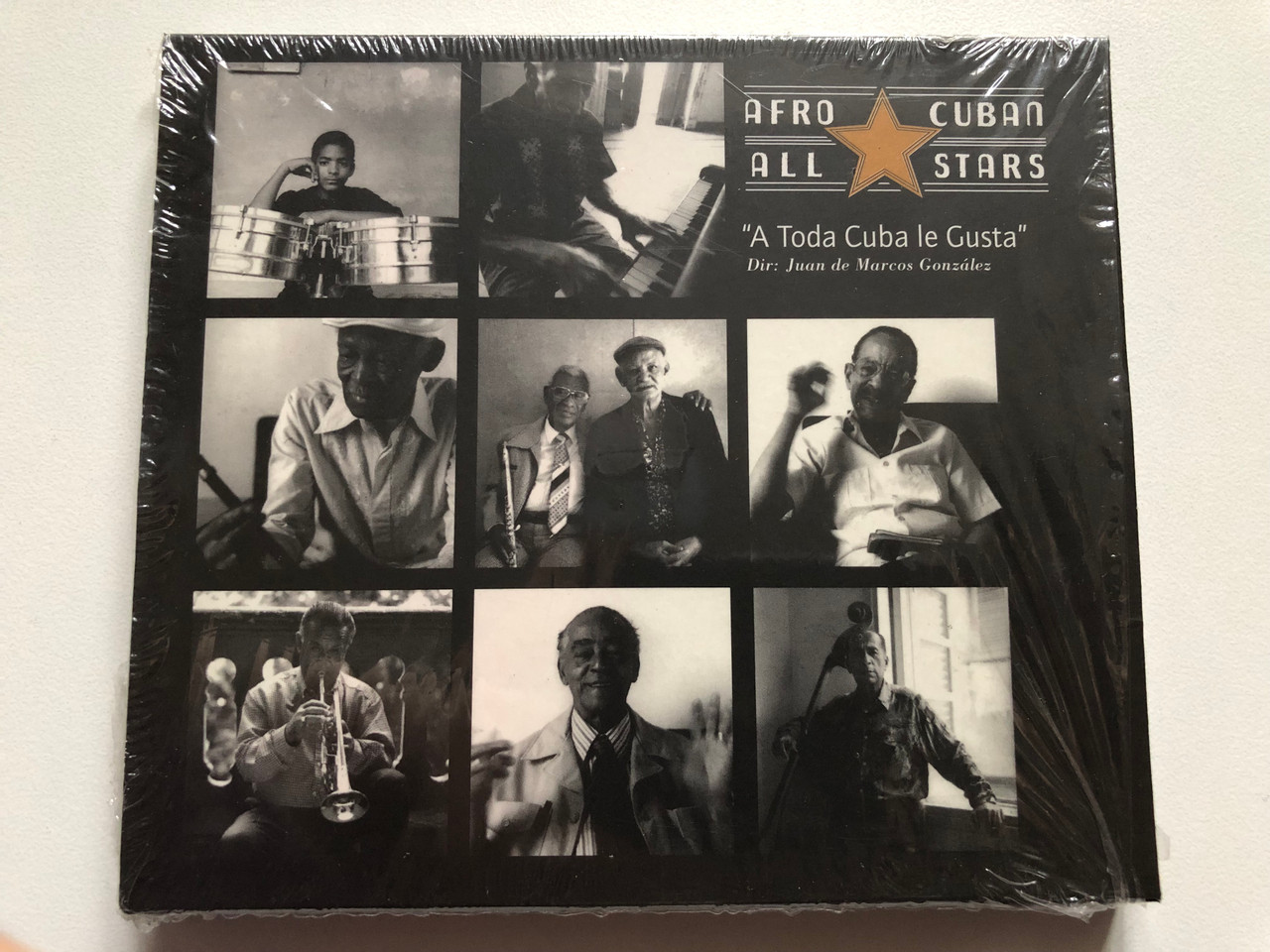 https://cdn11.bigcommerce.com/s-62bdpkt7pb/products/0/images/332580/Afro-Cuban_All_Stars_-_A_Toda_Cuba_le_Gusta_Dir_Juan_de_Marcos_Gonzales_World_Circuit_Audio_CD_1997_WCD_047_1__22291.1714460637.1280.1280.JPG?c=2