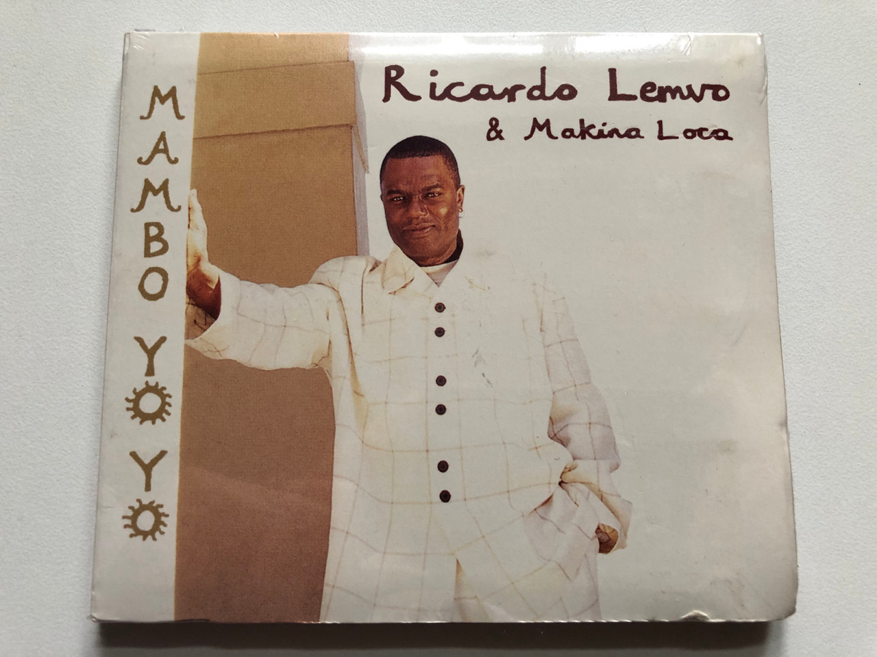 https://cdn11.bigcommerce.com/s-62bdpkt7pb/products/0/images/332586/Ricardo_Lemvo_Makina_Loca_Mambo_Yo_Yo_Putumayo_World_Music_Audio_CD_1998_PUTU_138-2_1__46947.1714462539.1280.1280.JPG?c=2