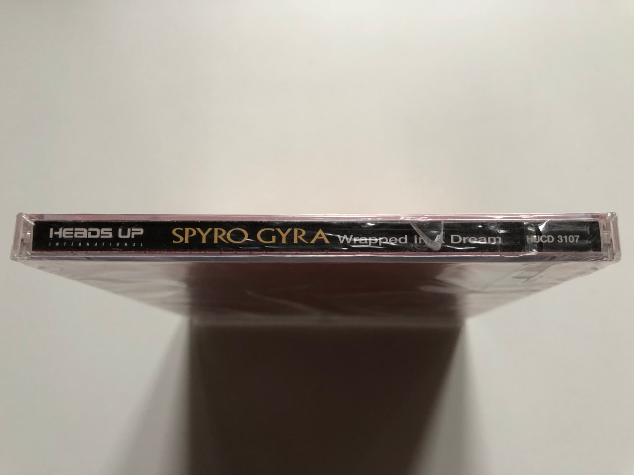 https://cdn11.bigcommerce.com/s-62bdpkt7pb/products/0/images/332673/Spyro_Gyra_Wrapped_In_A_Dream_Heads_Up_International_Audio_CD_2006_HUCD_3107_3__07826.1714540168.1280.1280.JPG?c=2