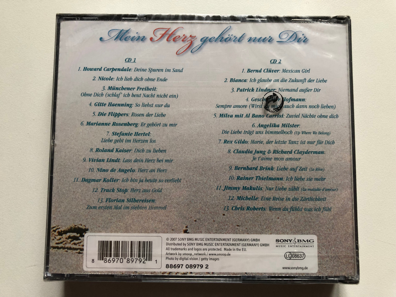 https://cdn11.bigcommerce.com/s-62bdpkt7pb/products/0/images/332690/Mein_Herz_gehrt_nur_Dir_-_26_Schlager_der_Liebe_auf_zwei_CDs_Sony_BMG_Music_Entertainment_2x_Audio_CD_2007_88697_08979_2_2__85193.1714543347.1280.1280.JPG?c=2