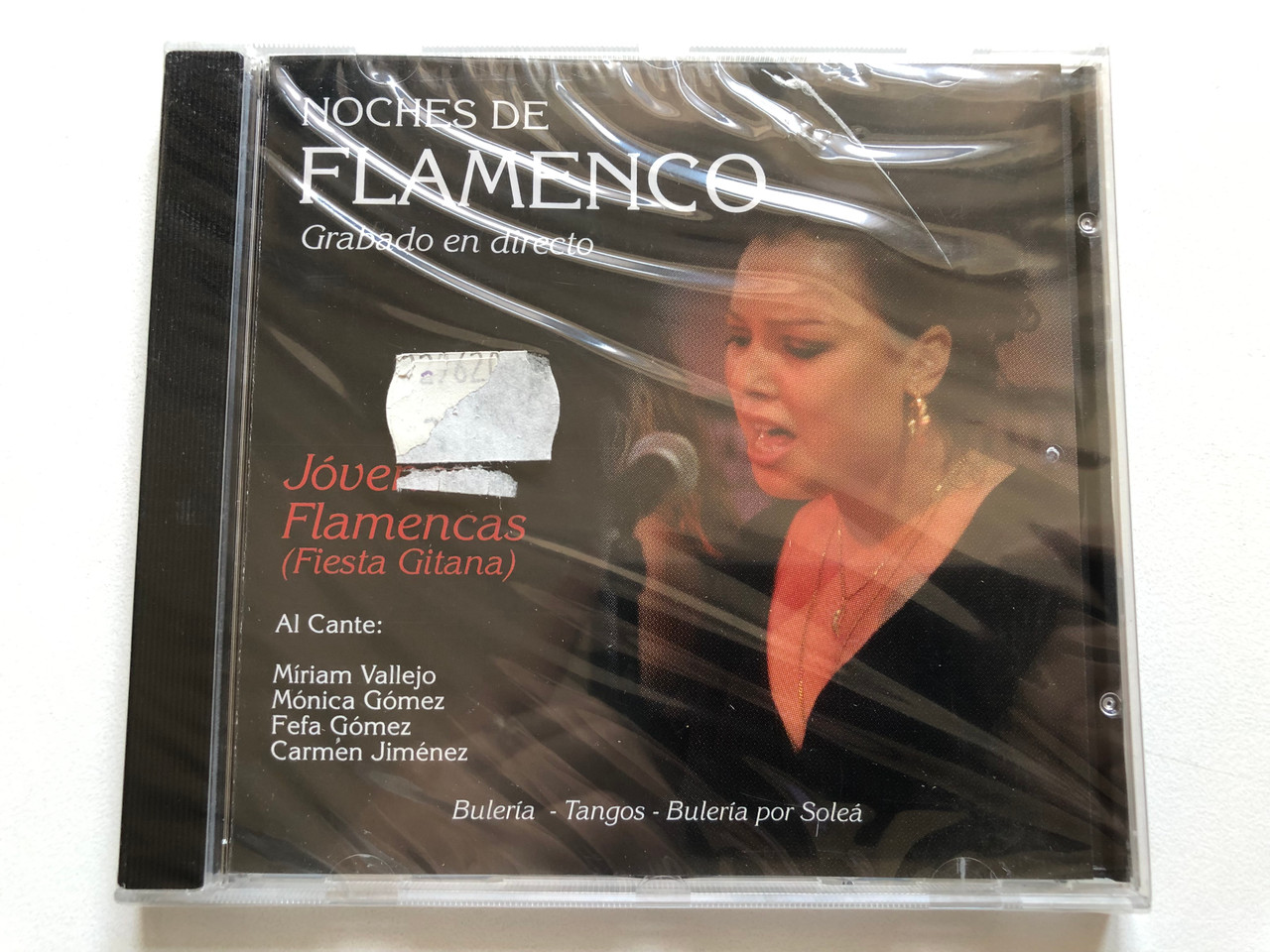 https://cdn11.bigcommerce.com/s-62bdpkt7pb/products/0/images/332724/Noches_De_Flamenco_Grabado_en_directo_-_Jovenes_Flamencas_Fiesta_Gitana_Al_Cante_Miriam_Vallejo_Monica_Gomez_Fefa_Gomez_Carmen_Jimenez_Buleria_-_Tangos_-_Buleria_po_Solea_Discmedi_Aud_1__61656.1714587866.1280.1280.JPG?c=2