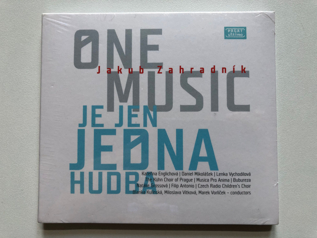 https://cdn11.bigcommerce.com/s-62bdpkt7pb/products/0/images/332739/One_Music_Je_Jen_Jedna_Hudba_-_Jakub_Zahradnik_Katerina_Englischova_Daniel_Mikolaek_Lenka_Vychodilova_The_Kuhn_Choir_of_Prague_Musica_Pro_Anima_Bubureza_Natalie_Grossova_Pagat_Ulti_1__20672.1714632610.1280.1280.JPG?c=2
