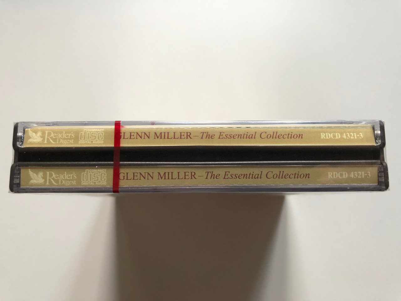https://cdn11.bigcommerce.com/s-62bdpkt7pb/products/0/images/332751/Glenn_Miller_The_Essential_Collection_Readers_Digest_3x_Audio_CD_2004_RDCD_4321-3_3__98459.1714635121.1280.1280.JPG?c=2