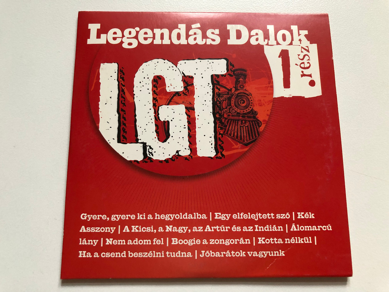 https://cdn11.bigcommerce.com/s-62bdpkt7pb/products/0/images/333151/LGT_Legends_Dalok_1._Rsz_-_Gyere_Gyere_Ki_A_Hegyoldalba_Egy_Elfelejtett_Sz_Kek_Asszony_A_Kicsi_A_Nagy_Az_Artr_s_Az_Indin_lomarc_Lny_Nem_Adom_Fel_Boogie_A_Zongorn_Hungarot_1__04241.1715179726.1280.1280.JPG?c=2
