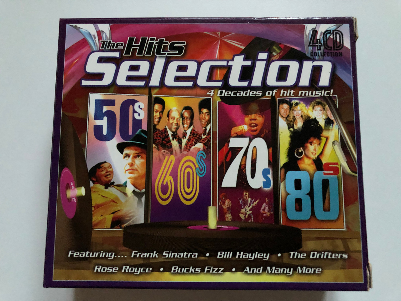 https://cdn11.bigcommerce.com/s-62bdpkt7pb/products/0/images/333211/The_Hits_Selection_-_4_Decades_of_hit_music_50s_60s_70s_80s_Featuring_Frank_Sinatra_Bill_Hayley_The_Drifters_Rose_Royce_Bucks_Fizz_And_Many_More_Going_for_a_Song_4x_Audio_CD_Box_Se_1__53167.1715257822.1280.1280.JPG?c=2
