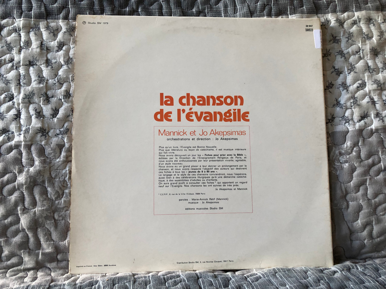 https://cdn11.bigcommerce.com/s-62bdpkt7pb/products/0/images/333501/La_Chanson_De_LEvangile_-_avec_Mannick_Et_Jo_Akepsimas_Editions_Studio_S.M._LP_1979_30_947_2__25300.1715587019.1280.1280.JPG?c=2